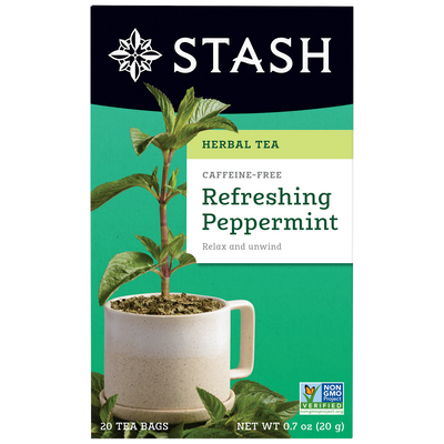 Stash Herbal Tea package for Refreshing Peppermint tea with a cup and peppermint leaves on a green background.