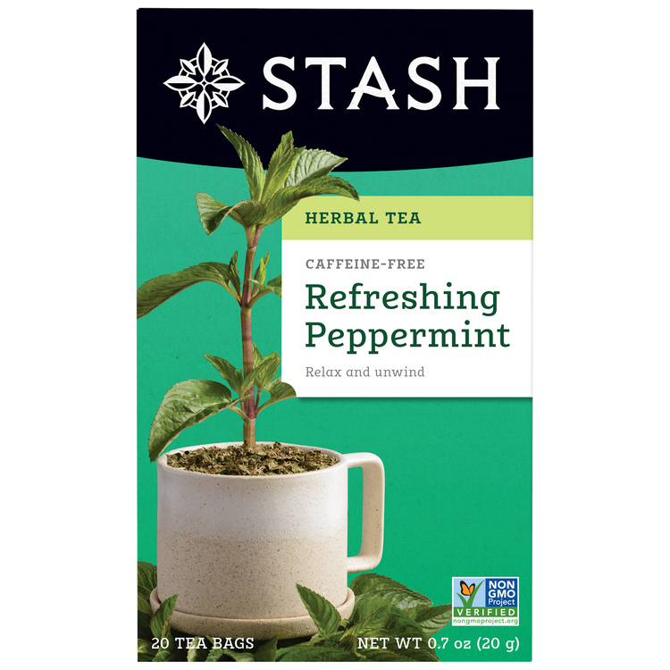 Stash Herbal Tea package for Refreshing Peppermint tea with a cup and peppermint leaves on a green background.