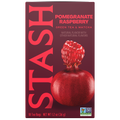 A box of Stash Pomegranate Raspberry green tea and matcha tea bags. The packaging is a deep burgundy color with large pink vertical 'STASH' lettering and a graphic of a red pomegranate with a raspberry on top.