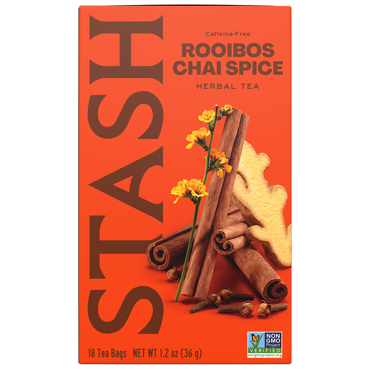 A box of Stash Rooibos Chai Spice herbal tea. The packaging is bright orange with large brown 'STASH' lettering, and an illustration of cinnamon sticks, ginger root, and yellow flowers.