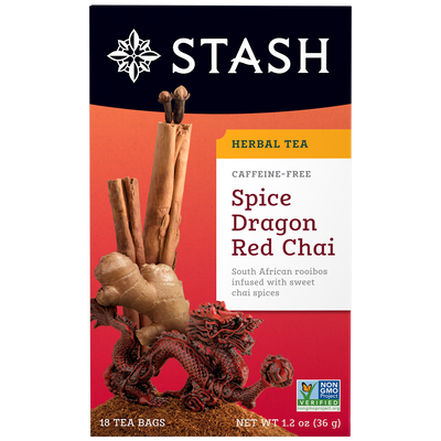 Stash Spice Dragon Red Chai tea package with dragon figurine on a red background