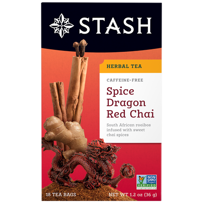 Stash Spice Dragon Red Chai tea package with dragon figurine on a red background