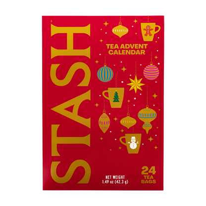 A red tea advent calendar box with large gold 'STASH' lettering and illustrated holiday ornaments, stars, mugs, and a snowman. Text on the package reads 'TEA ADVENT CALENDAR' and '24 TEA BAGS'.