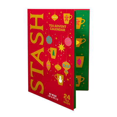 A Stash tea advent calendar box shown on a plain white background. The front is bright red with large gold 'STASH' lettering and festive illustrated ornaments and stars.