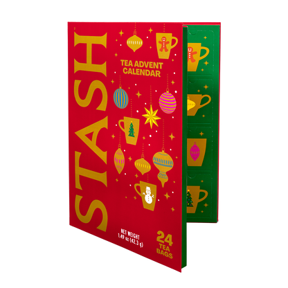A Stash tea advent calendar box shown on a plain white background. The front is bright red with large gold 'STASH' lettering and festive illustrated ornaments and stars.