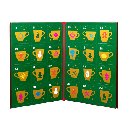 An open advent calendar with 24 numbered green panels, each decorated with a colorful holiday mug illustration and a red spine.