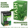 A promotional graphic showing two Stash Premium Green tea boxes on a white background, with text reading 'SAME ICONIC FLAVOR' and 'REIMAGINED STYLE.' The left box is smaller, black, and white, while the right box is larger, green, and features a tea leaf illustration.