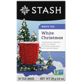 Stash White Christmas white tea packaging with a red knitted blanket and snow-covered trees.